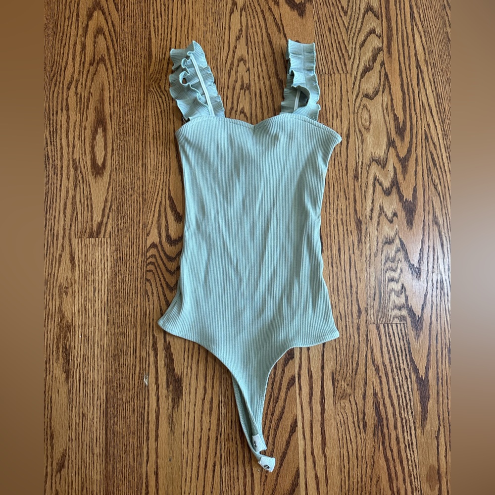 Francesca’s Sage Green Ruffle Bodysuit